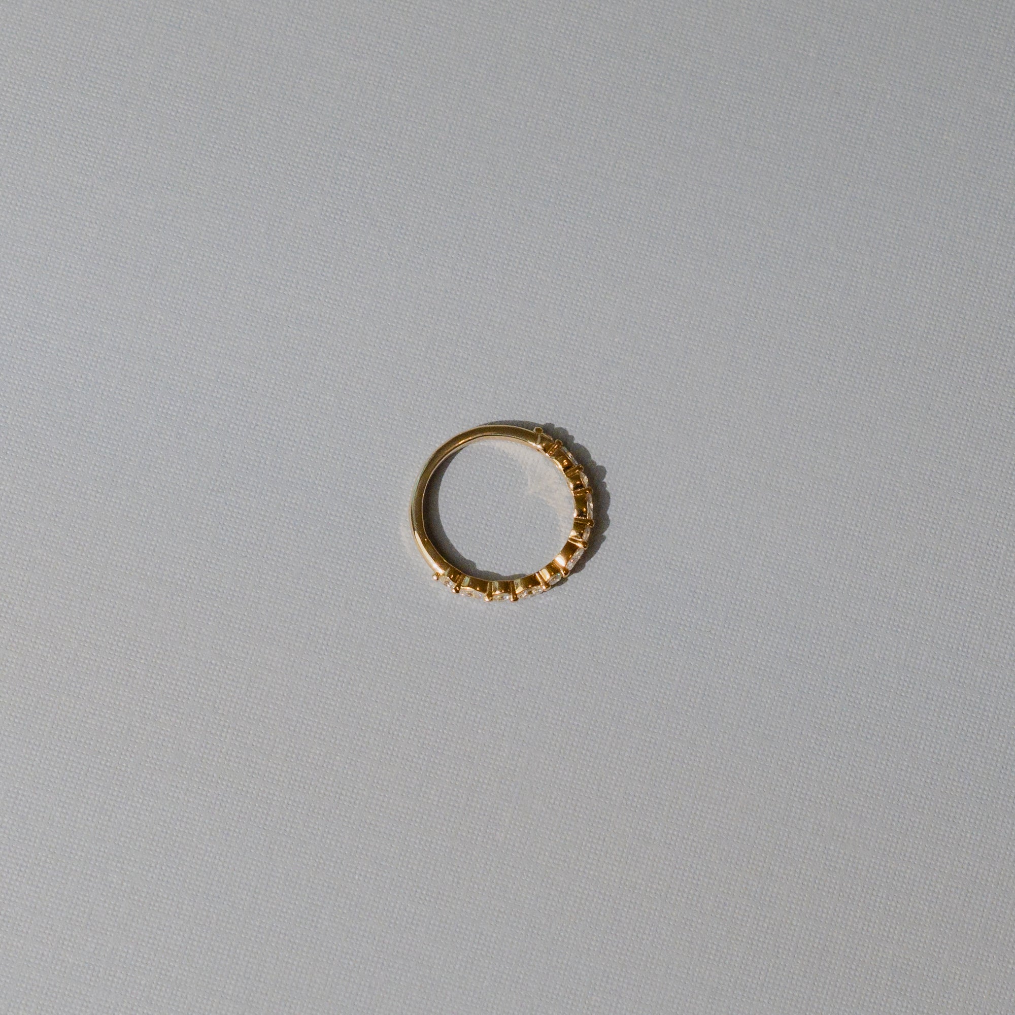 The Audrey Single Shared Prong Wedding Band